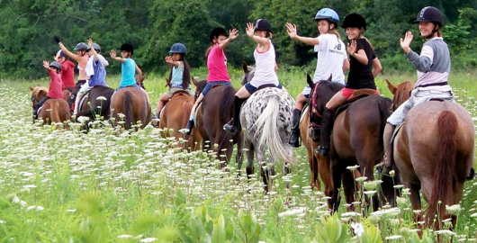 trail-riding-at-horseback-riding-camp.jpg