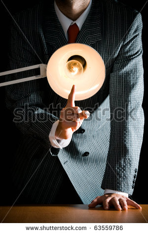 stock-photo-suggestive-interrogation-concept-interrogating-person-standing-behind-desk-lamp-63559786.jpg