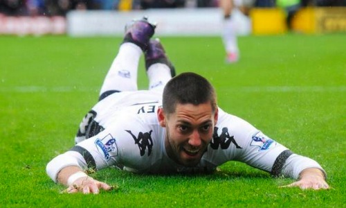 clint-dempsey-fulham-slide.jpg