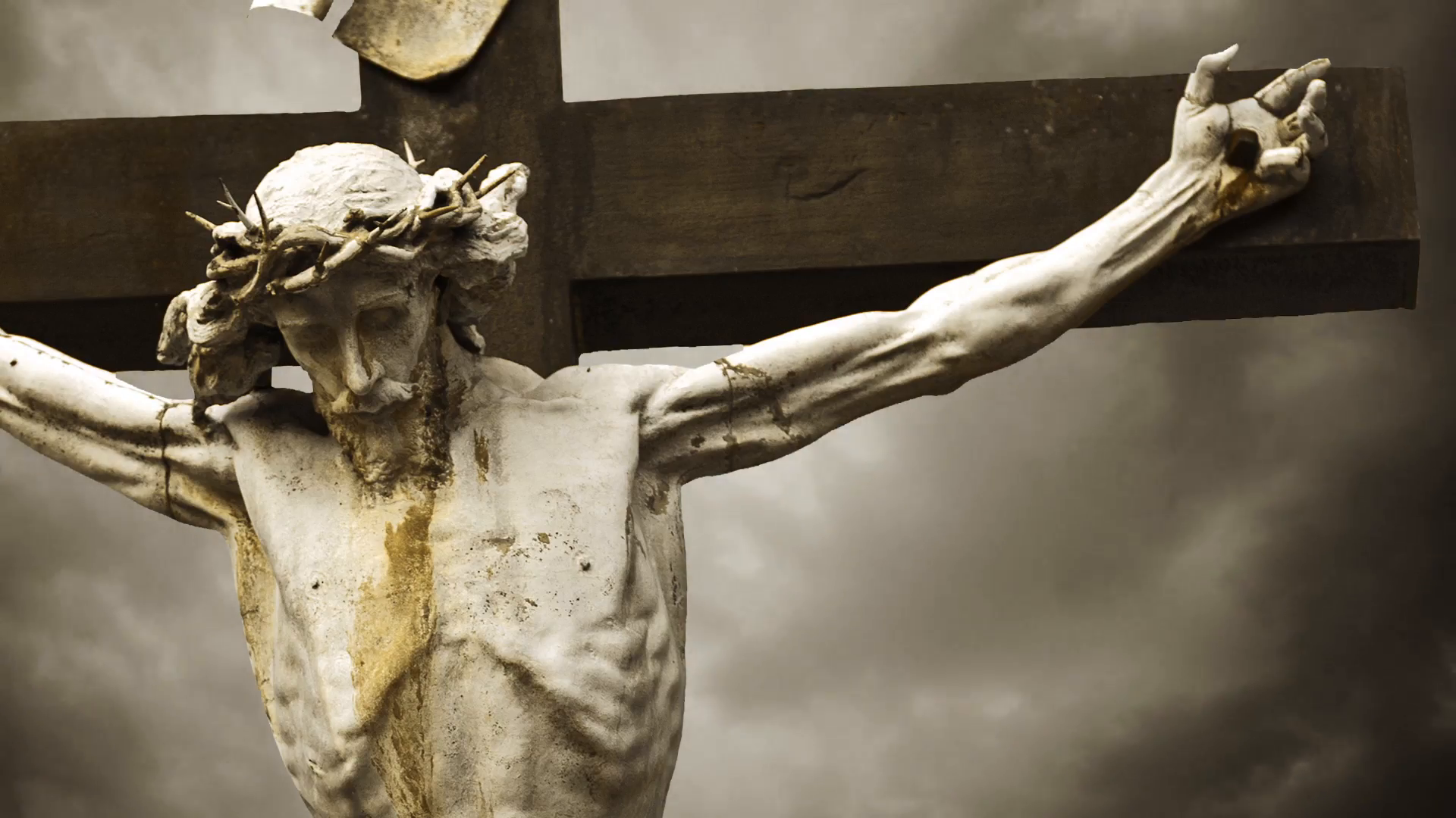 crucifixion-christian-cross-with-jesus-christ-statue-over-stormy-clouds-time-lapse-1920x1080-1080p-hd-format_71gocrfi_f0000.png