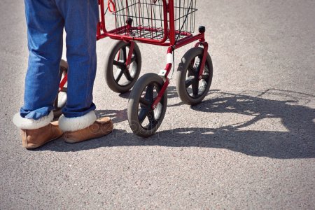 depositphotos_11050510-stock-photo-woman-with-walking-frame.jpg