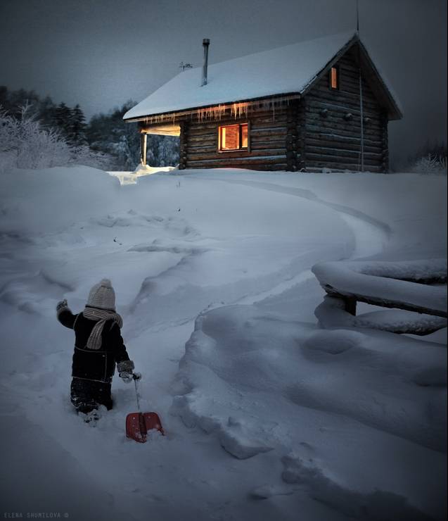 elena-shumilova-boy-trekking-through-snow.jpg