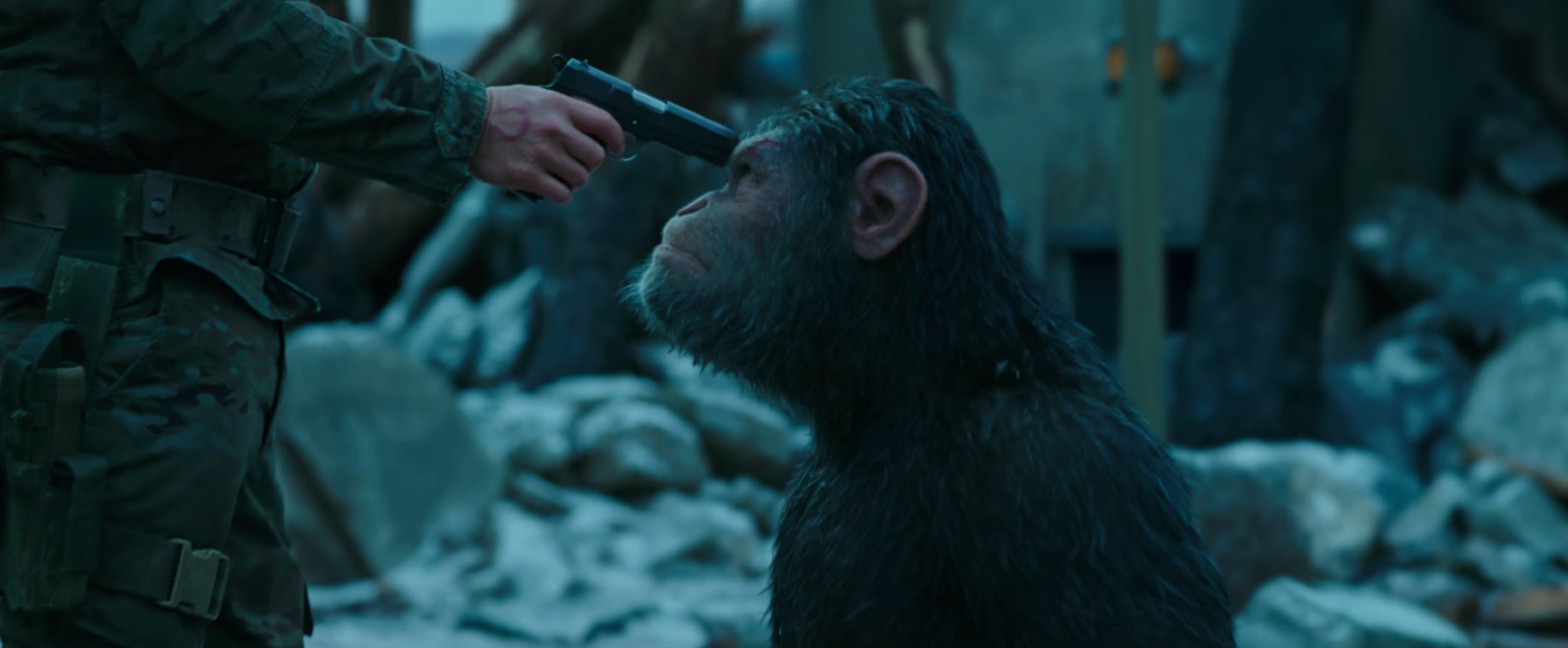 war-for-the-planet-of-the-apes-ceasar-and-woody-gun-to-the-head.jpg