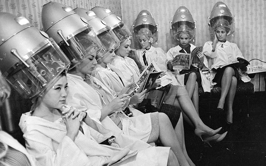 1963 Miss World contestants visit a hairdresser before the big event.jpg