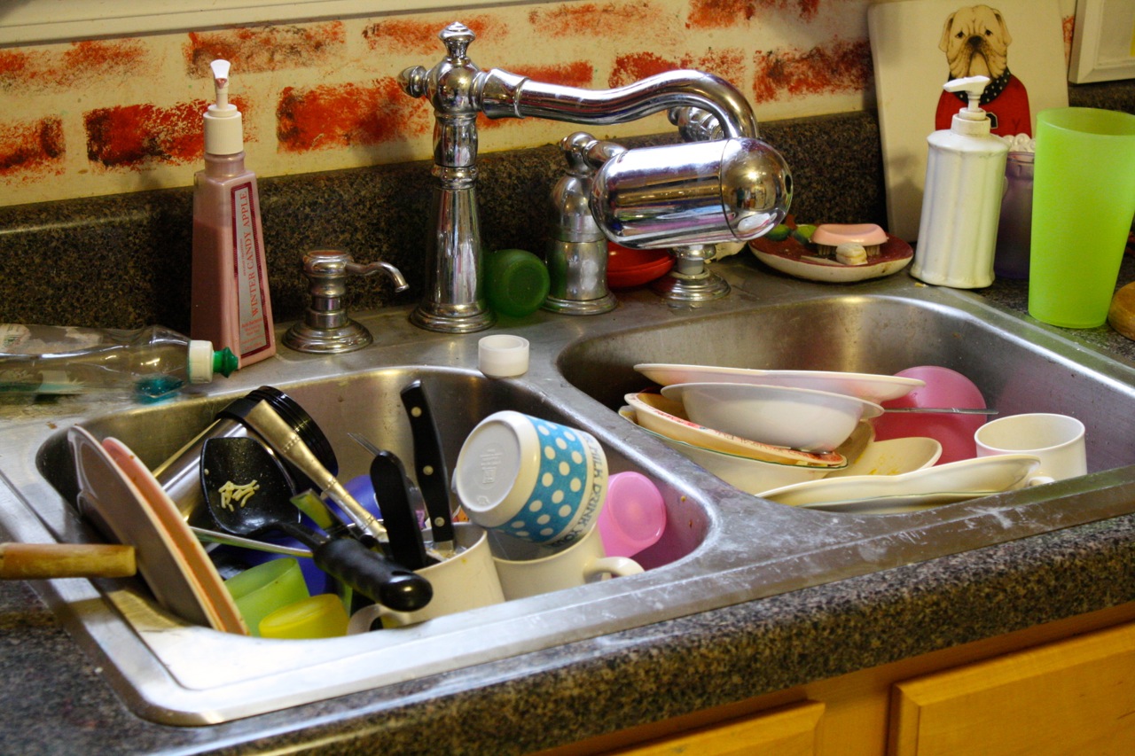 piled-up-dishes-in-kitchen-sink.jpg