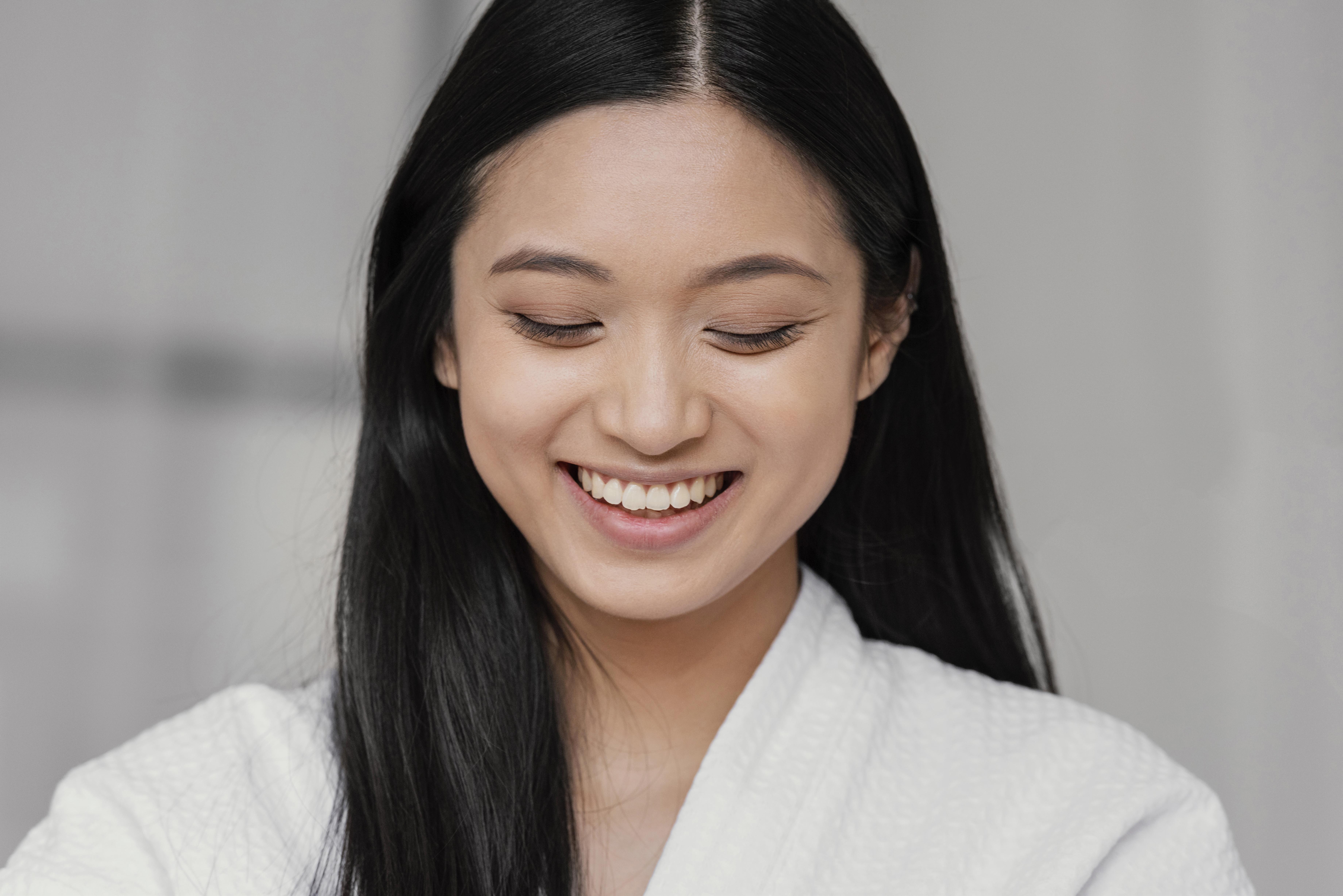 smiley-asian-woman-home.jpg