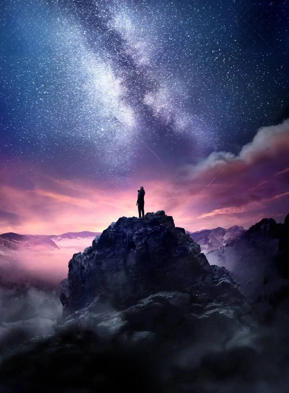 132330923-night-sky-long-exposure-landscape-a-man-standing-on-a-high-rock-watching-the-stars-rise-into-the-transformed.jpg