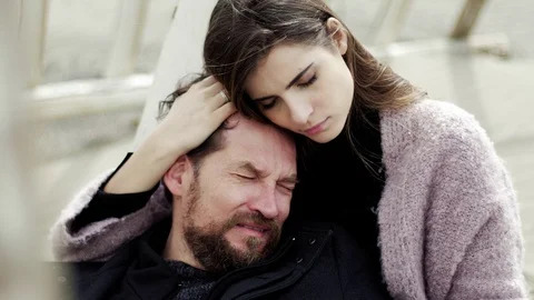 man-crying-woman-trying-comfort-footage-074860100_iconl.jpg