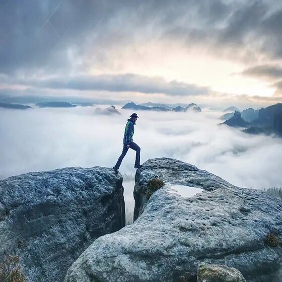 man-finnaly-standing-rock-enjoy-foggy-mountain-view-male-hiker-stock-enjoying-165731202-transformed.jpg