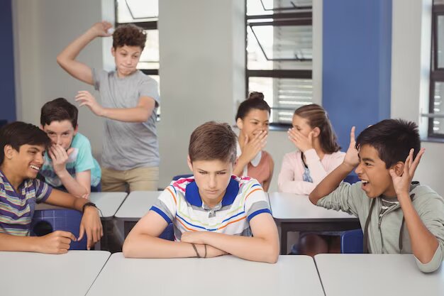 school-friends-bullying-sad-boy-classroom_107420-85489.jpg