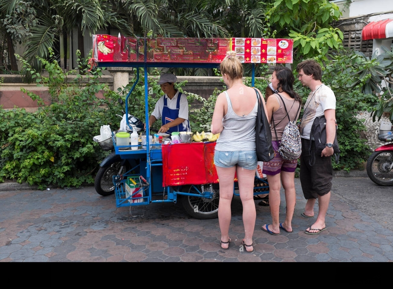 western-tourists-queue-at-pancake-stall-in-pattaya-thailand-h54c0m-transformed.jpeg