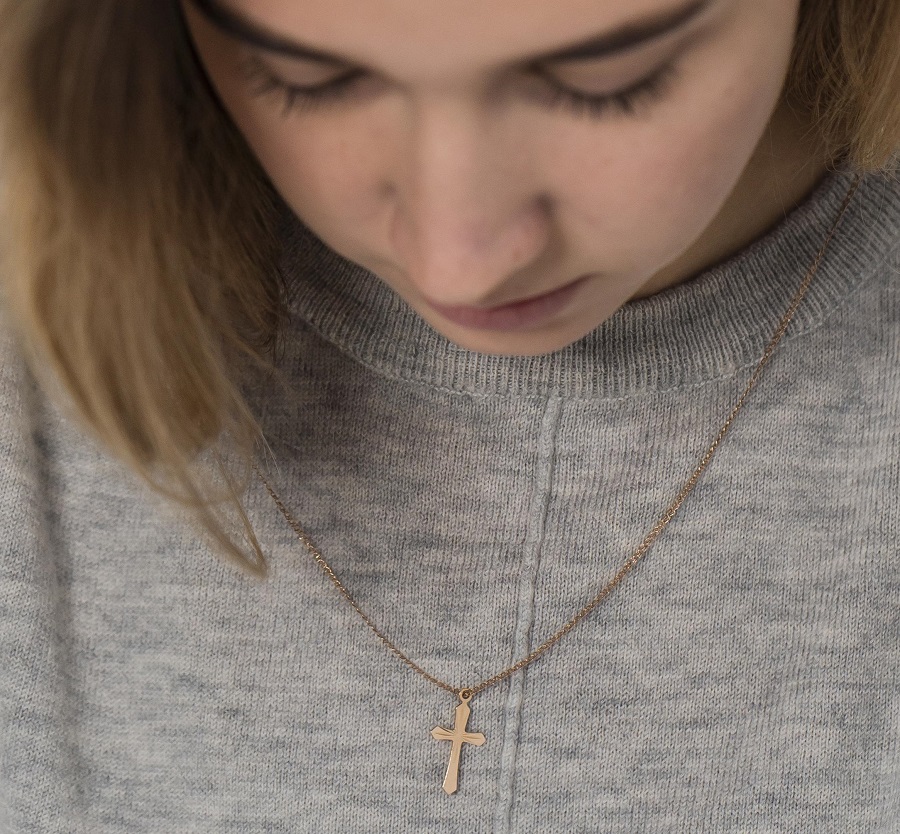 front-view-woman-wearing-cross-necklace.jpg