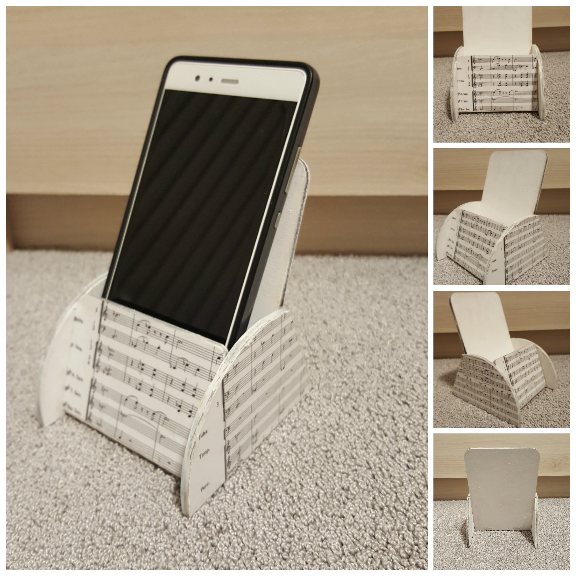 12x8 cm-s telefontartó, fehér alapon (Hidas - Szvit) partitúra részlettel. Nagyobb telefonok, illetve szemüveg tárolására alkalmas. 