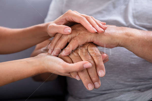 9425522_stock-photo-daughter-holding-her-fathers-hand.jpg