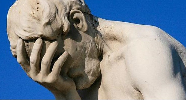 cropped-paris_tuileries_garden_facepalm_statue.jpg