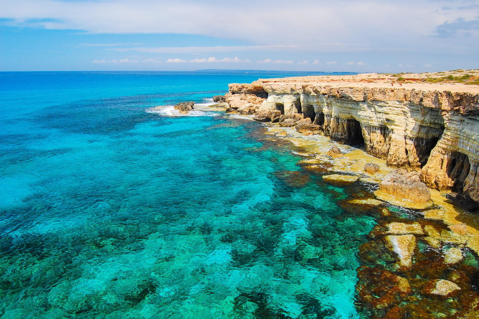 rock-cliffs-and-azure-sea-water-near-cavo-greko-peninsula-cyprus-island-1536x1024.jpg