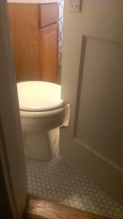 awkward-bathroom-cut-door.jpg