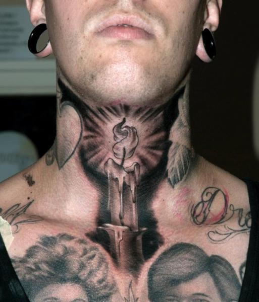 black-and-grey-burning-candle-tattoo-on-man-neck.jpg