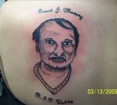 funny-face-tattoo-on-back.jpg