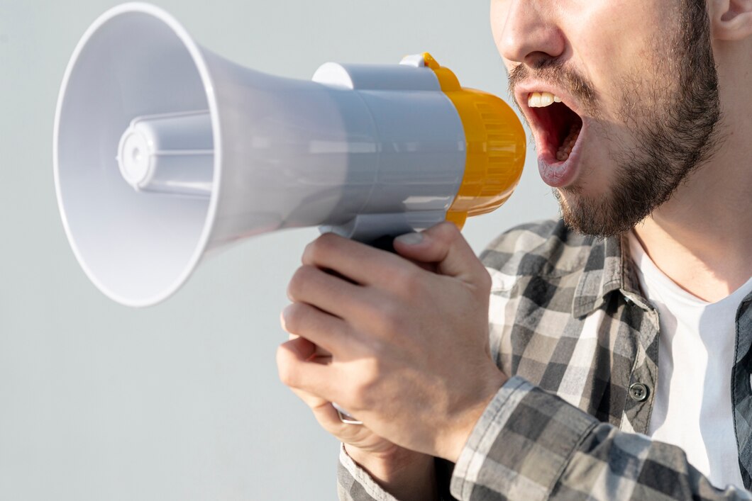 man-with-megaphone-shouting_23-2148296513.jpg