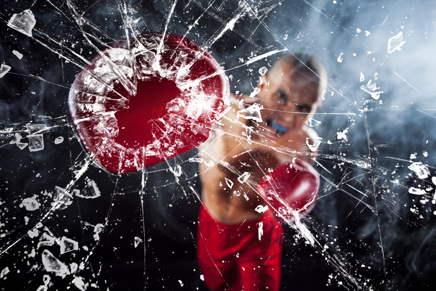 boxer-crushing-glass-young-male-athlete-kickboxing-blue-smoke_master1305_freepik.jpg