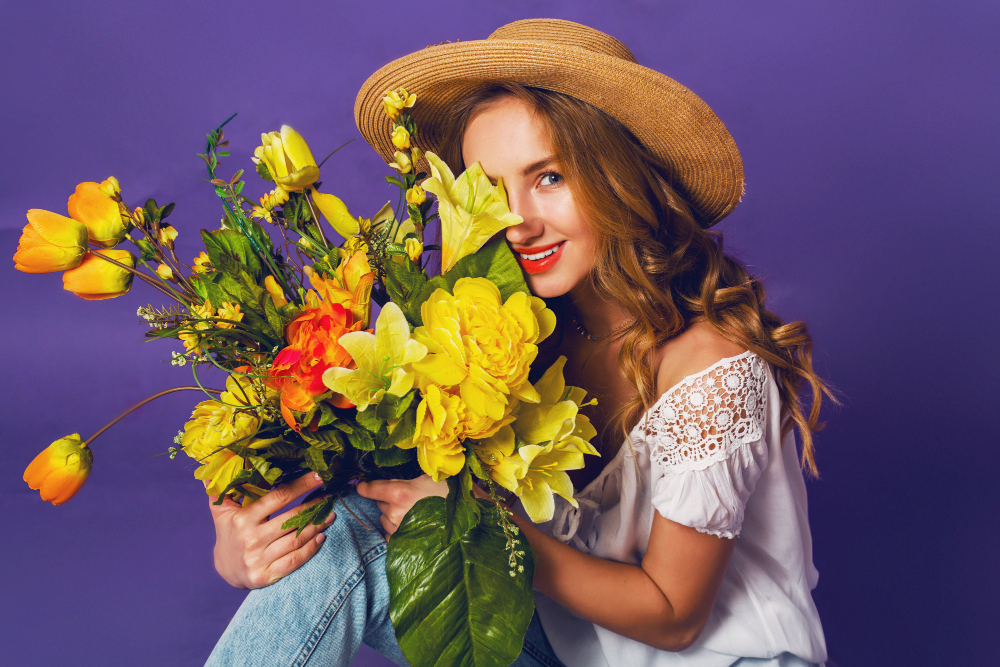 close-up-spring-portrait-beautiful-blonde-young-lady-stylish-straw-summer-hat-holding-colorful-spring-flower-bouquet-near-purple-wall-background_svetlanasokolova_freepik.jpg
