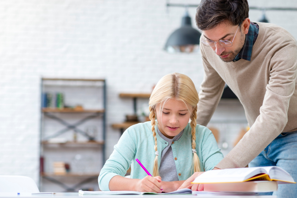 father-daughter-doing-homework_freepik.jpg