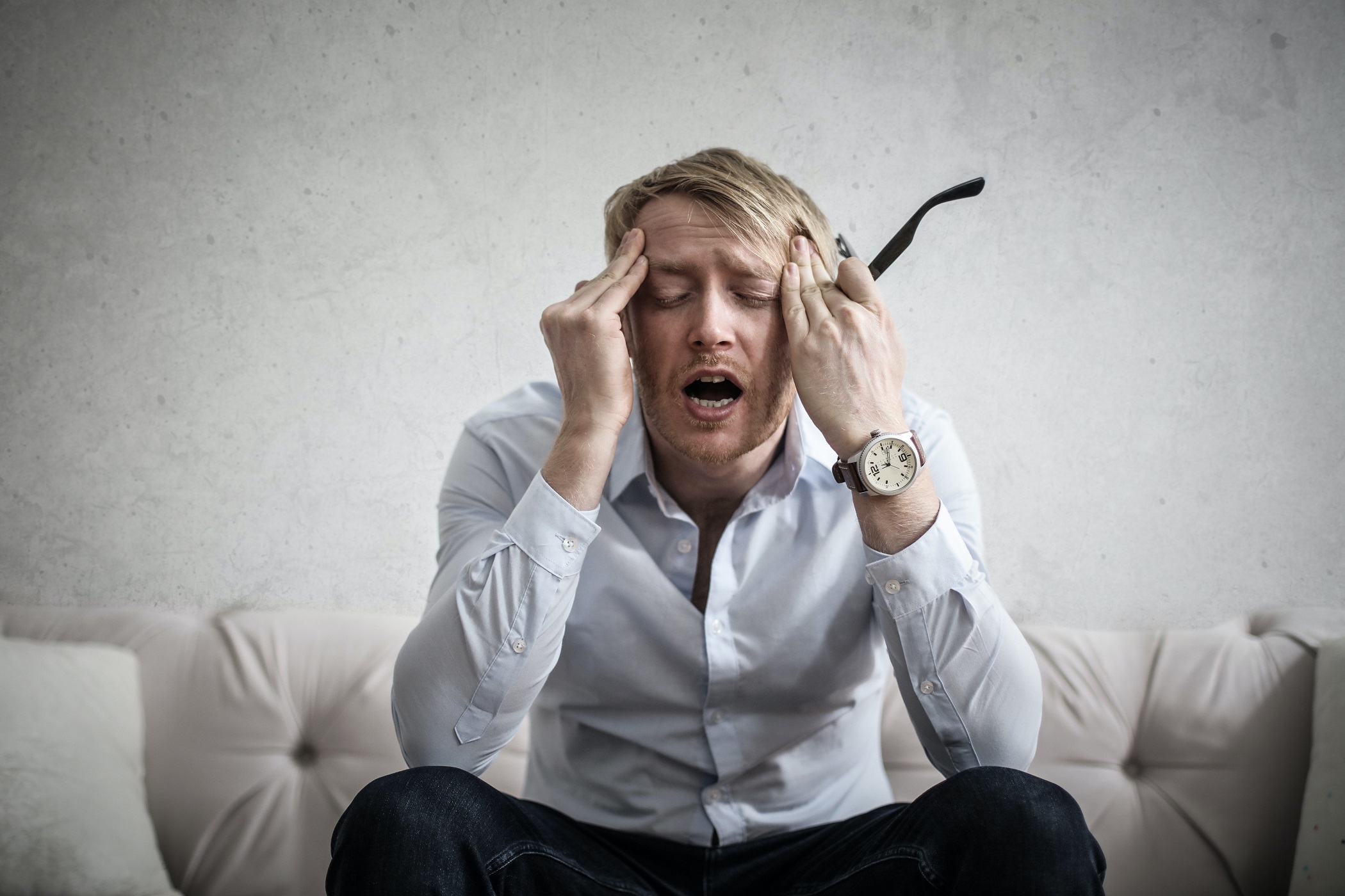 photo-of-man-touching-his-head-andrea_piacquadio_pexels.jpg