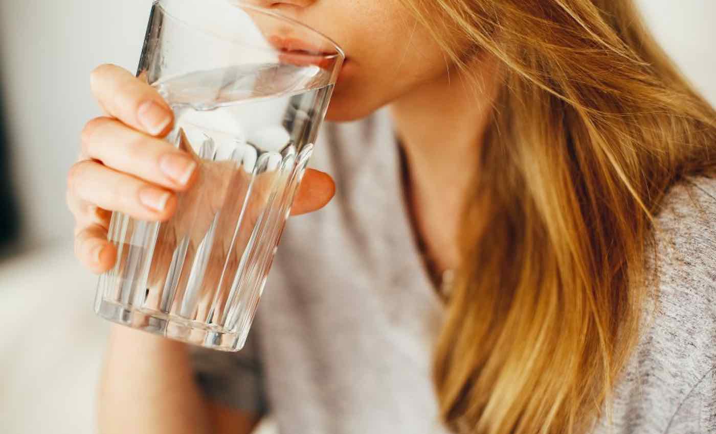 woman-lady-girl-drinking-a-cup-of-water-swns.jpg