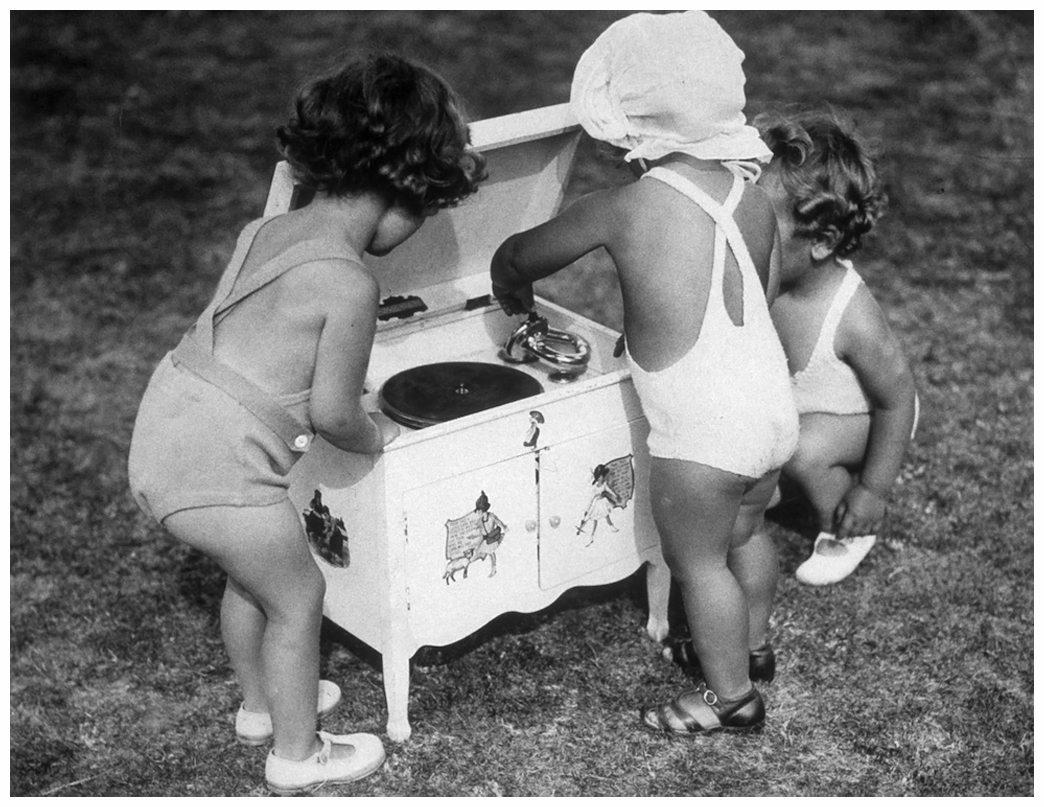 31st-august-1935-three-young-children-playing-records-on-a-special-record-player-in-the-garden-of-the-childrens-hotel-in-kent-photo-by-fox-photosgetty-images.jpg