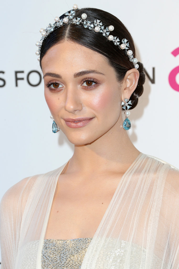 Emmy-Rossum-took-simple-centre-parted-hairstyle-made-stunning-addition-twisted-wire-headband-pearls-beads-sparkle-Matching-earrings-finished-look.jpg