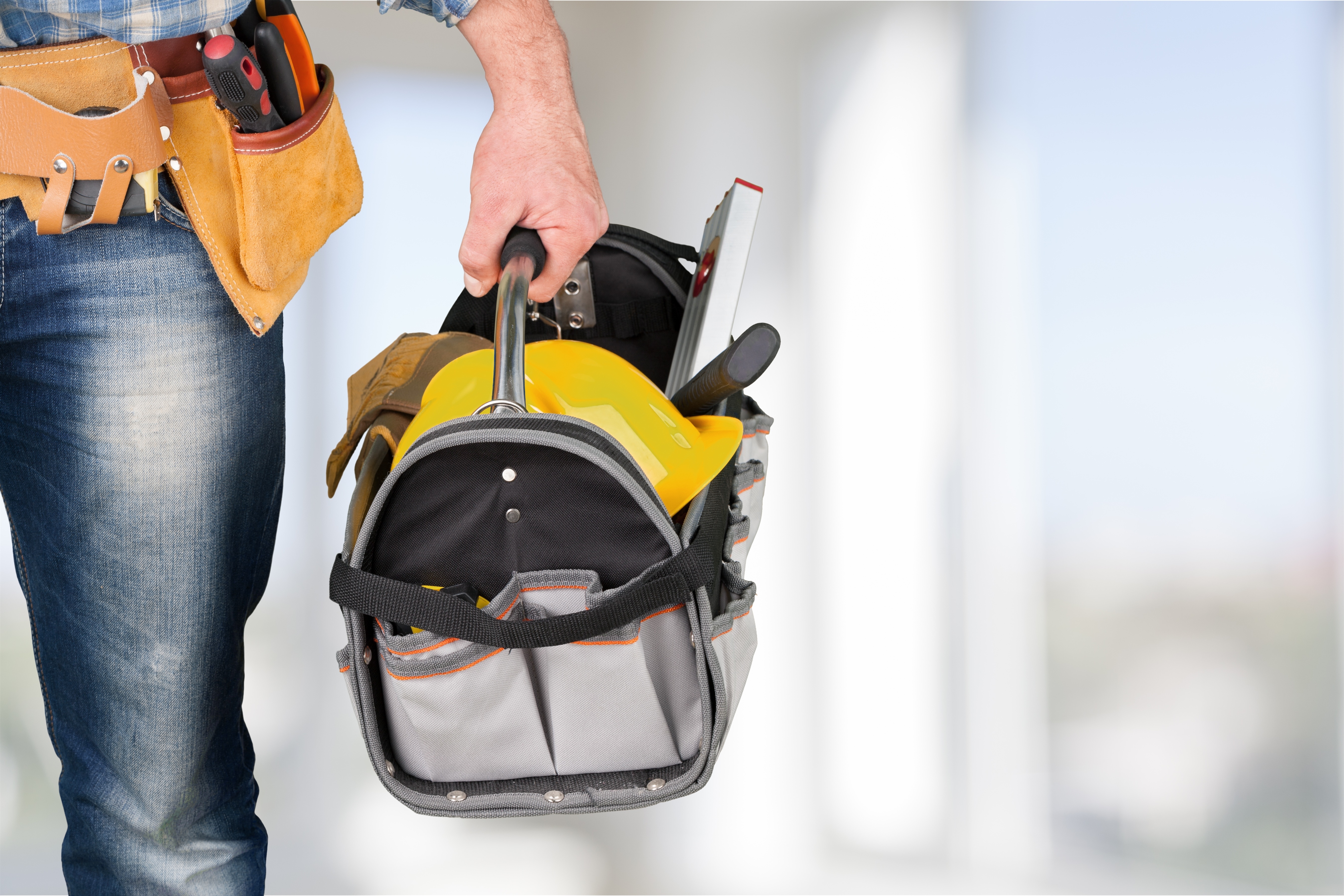 male-worker-with-tool-belt-isolated-white-background.jpg
