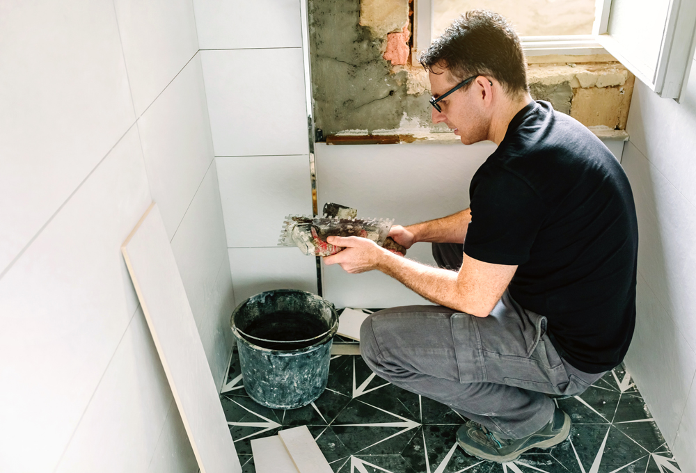 mason-working-on-a-bathroom-renovation.jpg