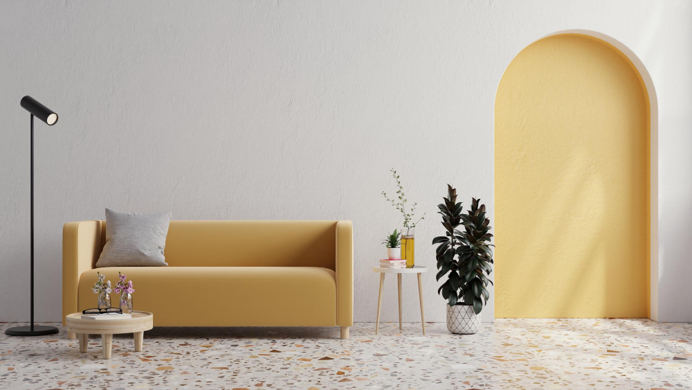 yellow-sofa-with-plant-white-wall-terrazzo-flooring.jpg