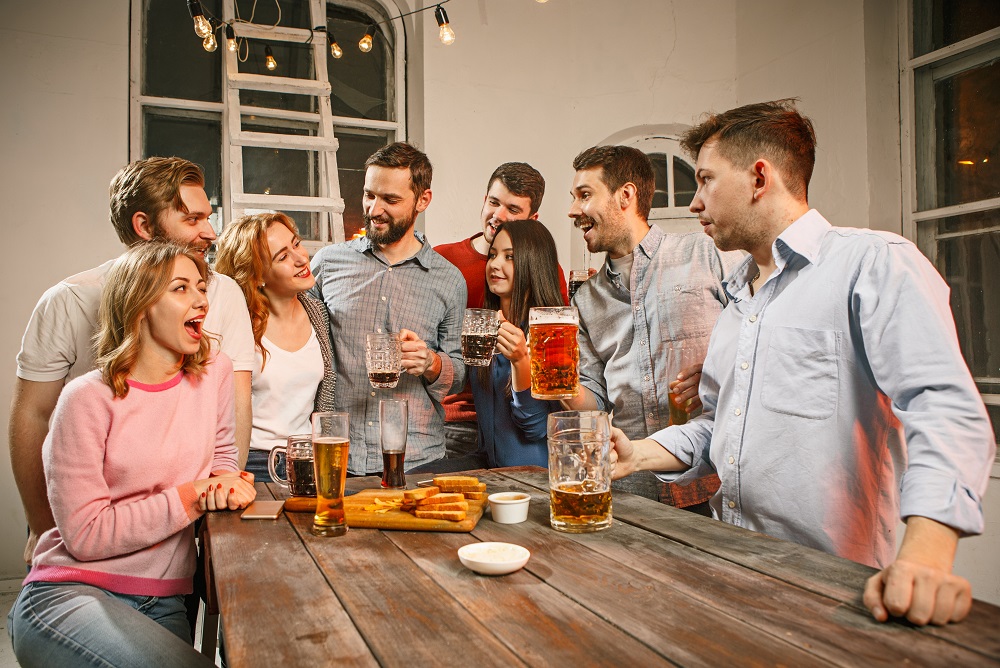 group-friends-enjoying-evening-drinks-with-beer.jpg