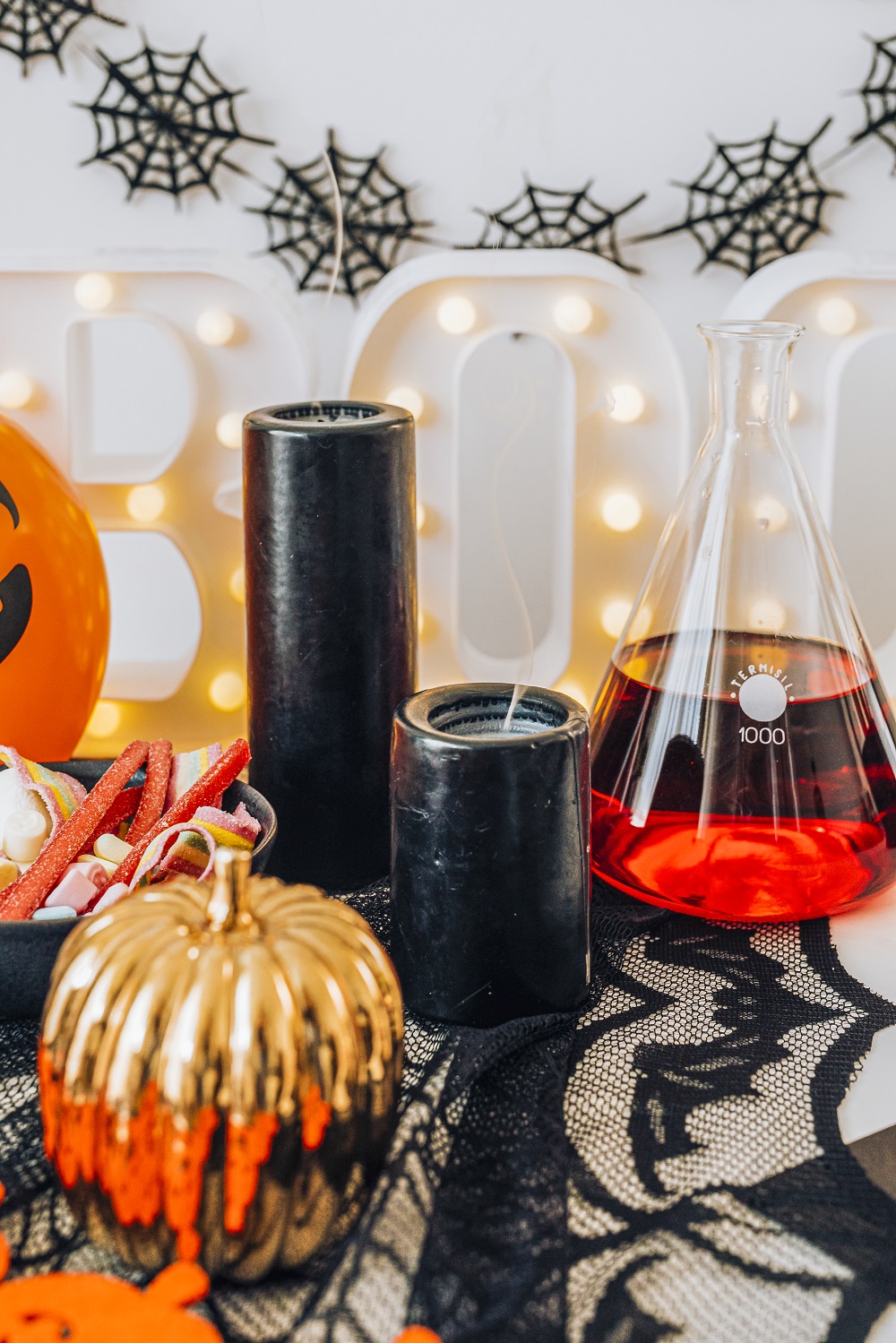 halloween-decoration-with-pumpkin-jar-flask-filled-with-red-liquid.jpg