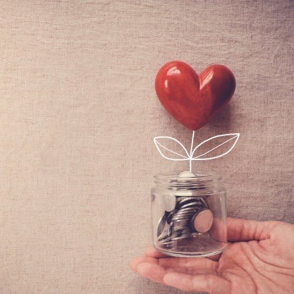 hand-holding-jar-heart-tree-growing-money-coins_49149-473.jpg