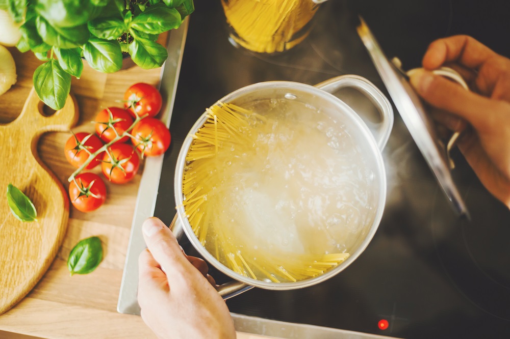 man-cooking-pasta-in-boiling-water.jpg