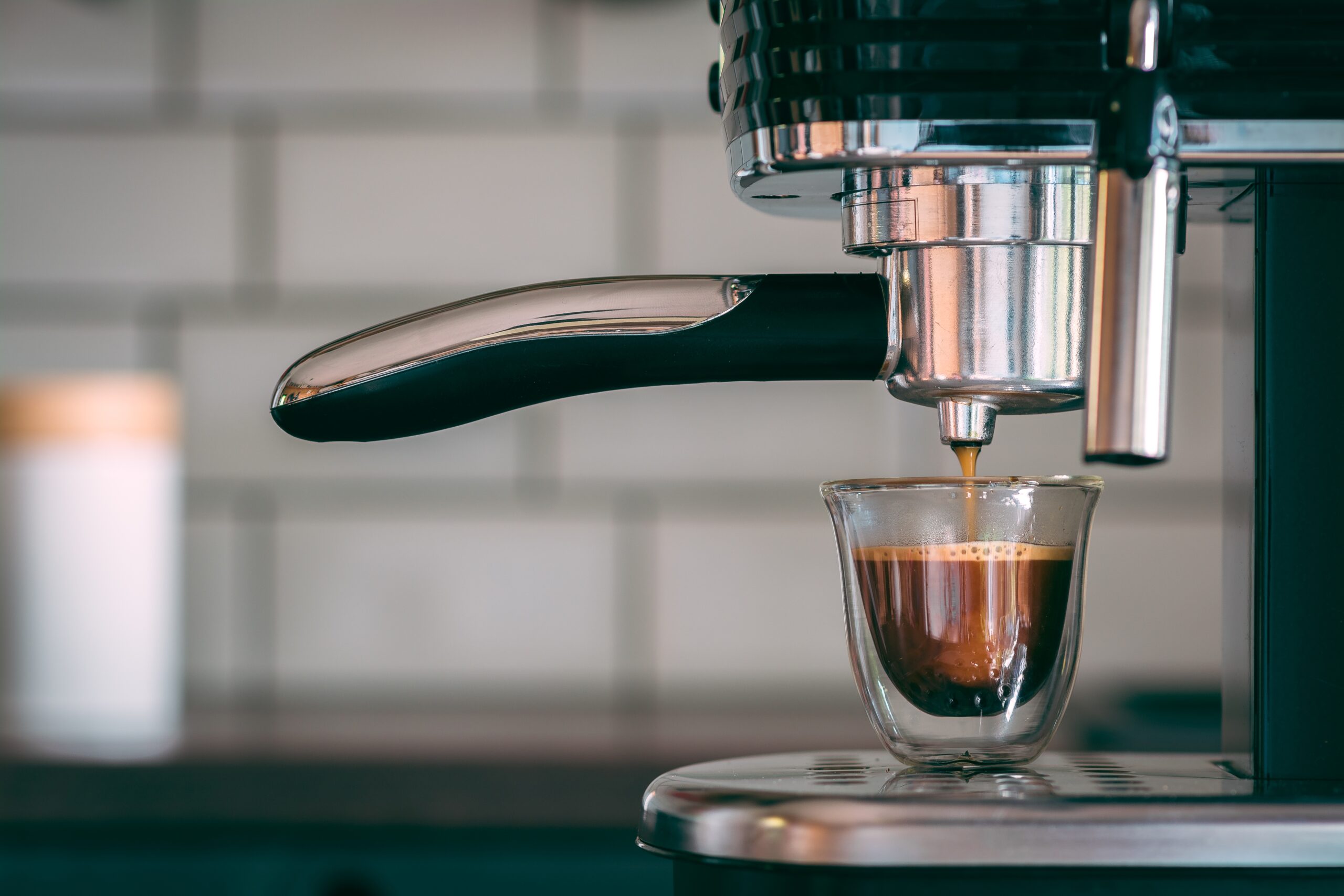 selective-focus-shot-espresso-machine-making-tasty-warm-coffee-morning-scaled.jpg