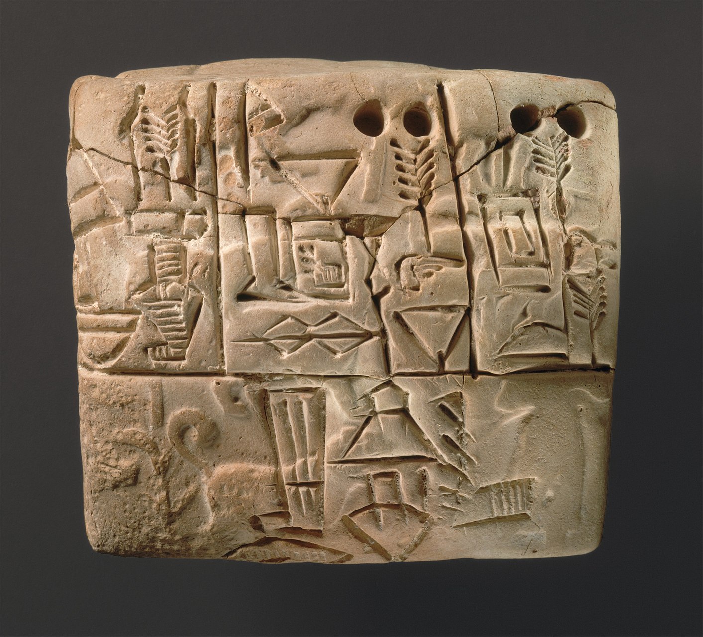 cuneiform_tablet-_administrative_account_of_barley_distribution_with_cylinder_seal_impression_of_a_male_figure_hunting_dogs_and_boars_met_dt847.jpg