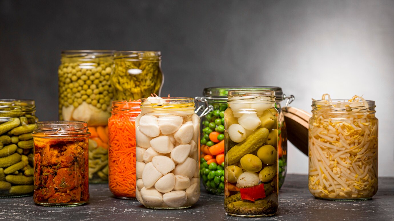front-view-assortment-vegetables-pickled-clear-glass-jars_23-2148738075.jpg