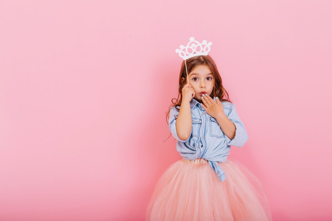surprised-pretty-young-girl-tulle-skirt-with-crown-head-expressing-isolated-pink-background-amazing-cute-little-princess-carnival-place-text_197531-3573.jpg