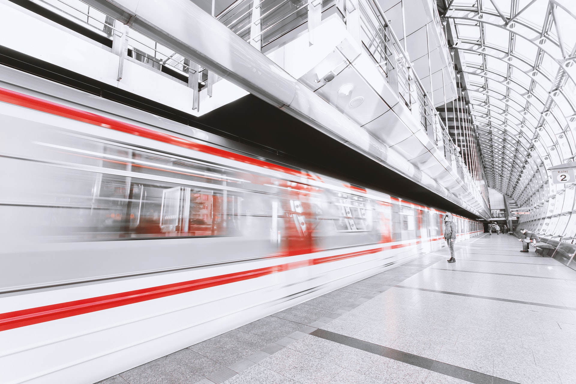 blurred-motion-of-illuminated-railroad-station-in-city-253647.jpg