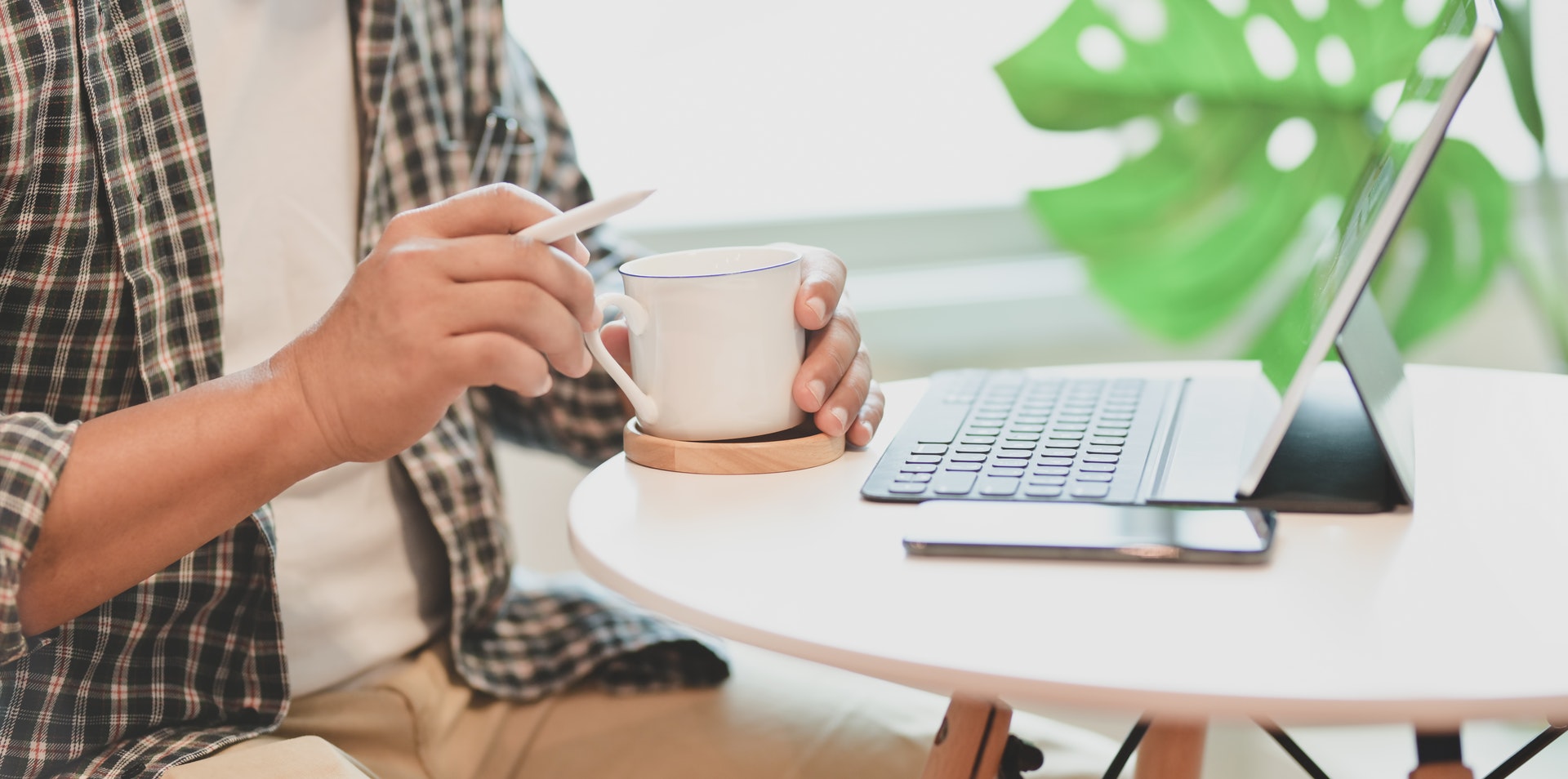 person-holding-white-coffee-cup-3740327.jpg