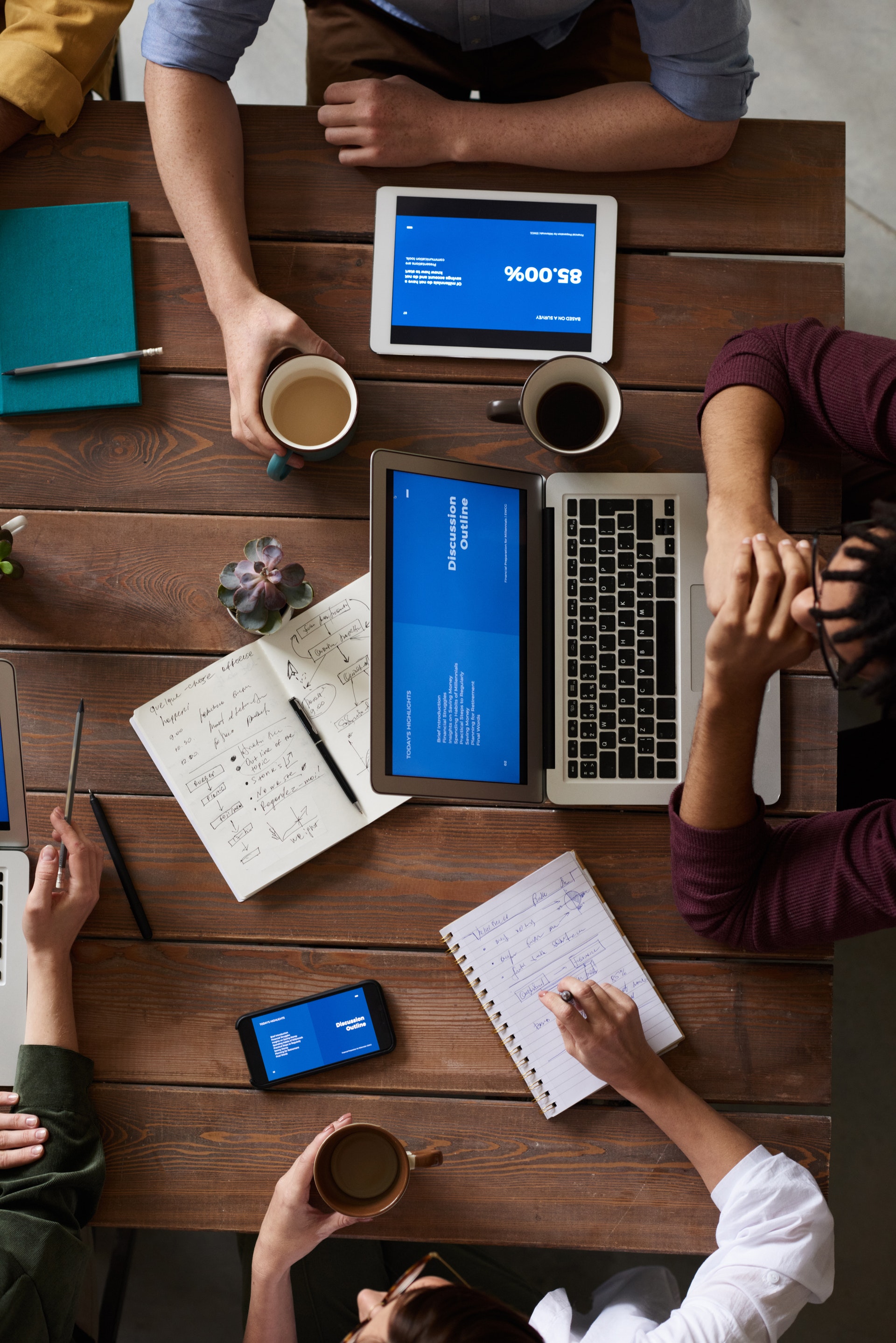 top-view-photo-of-people-having-a-meeting-3183165.jpg