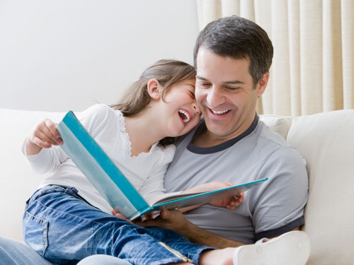 7-father-reading-book-child-lgn-40575271.jpg
