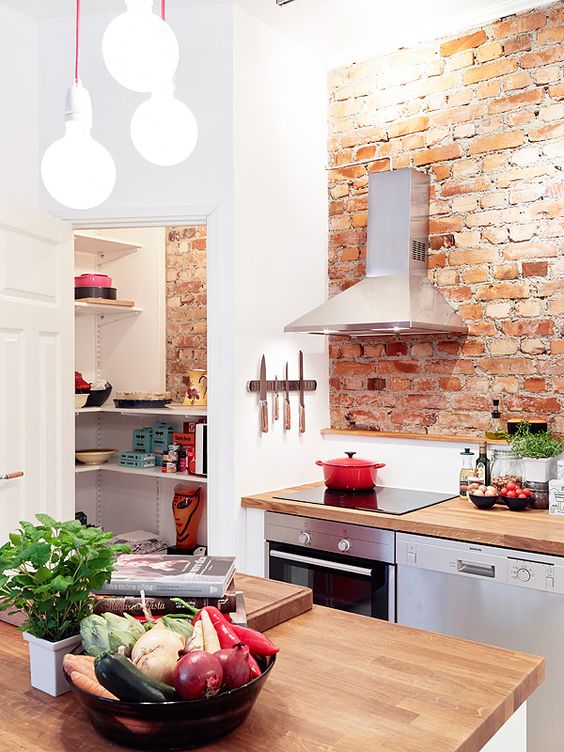 cozy-little-kitchen-with-exposed-brick-wall-and-cute-pantry.jpg