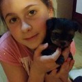 My daughter with a cute little dog...
