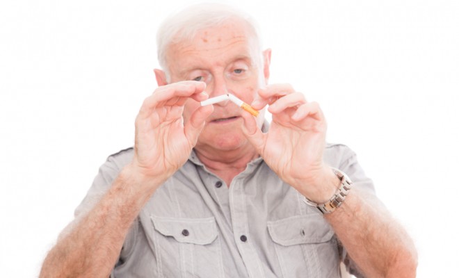 old-man-breaking-cigarette_95211721-660x400.jpg