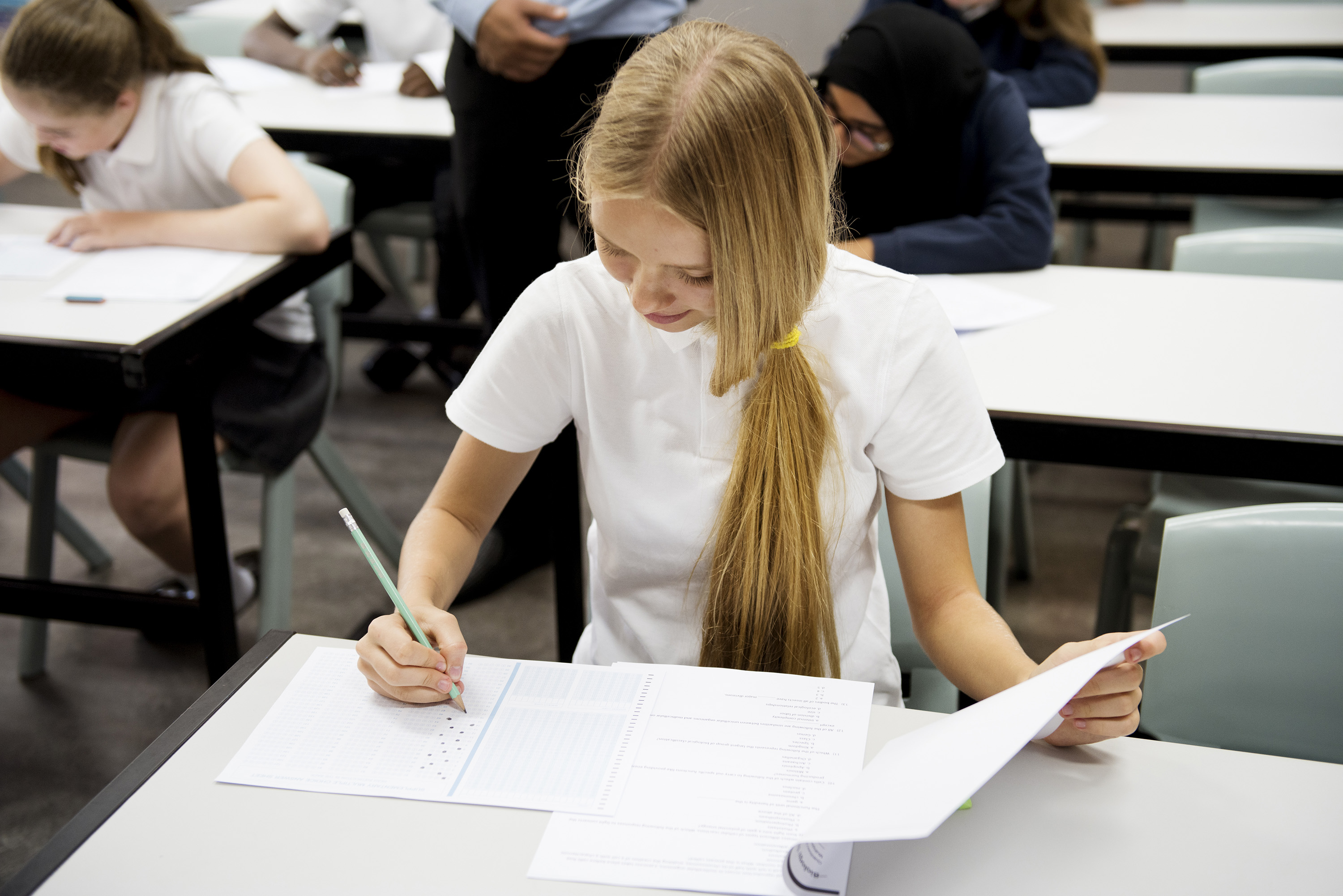 students-doing-the-exam-in-classroom-2023-11-27-04-51-23-utc_1.jpg